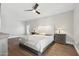 Serene main bedroom with hardwood floors, ceiling fan and neutral decor at 2251 N 32Nd St # 31, Mesa, AZ 85213