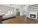 Spacious main bedroom featuring a fireplace, television and access to the outside at 2251 N 32Nd St # 31, Mesa, AZ 85213