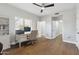 Office space featuring a ceiling fan, a desk, and access to other rooms at 2251 N 32Nd St # 31, Mesa, AZ 85213