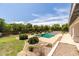 Inviting backyard pool with well-maintained landscaping and lots of mature trees at 2251 N 32Nd St # 31, Mesa, AZ 85213
