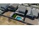 Aerial view of a backyard with a pool, hot tub, covered patio, and green grass at 22752 E Arroyo Verde Dr, Queen Creek, AZ 85142