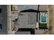 Aerial view of a home with a swimming pool, green yard, and gray tile roof at 22752 E Arroyo Verde Dr, Queen Creek, AZ 85142