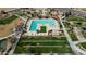 Aerial shot of the community pool with lounge chairs, greenery, and recreational spaces at 22752 E Arroyo Verde Dr, Queen Creek, AZ 85142
