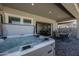 Outdoor hot tub located near outdoor dining and access to the home at 22752 E Arroyo Verde Dr, Queen Creek, AZ 85142