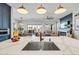 Open-concept kitchen showcasing modern island, stainless steel appliances, and inviting living space at 22752 E Arroyo Verde Dr, Queen Creek, AZ 85142