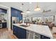 Bright open concept kitchen featuring a large island and a beautiful view to the backyard at 22752 E Arroyo Verde Dr, Queen Creek, AZ 85142