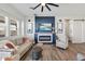 Chic living room features a modern fireplace and comfortable seating, perfect for relaxation at 22752 E Arroyo Verde Dr, Queen Creek, AZ 85142
