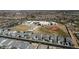 Aerial view of a neighborhood, showcasing the school and the surrounding residential area at 22752 E Arroyo Verde Dr, Queen Creek, AZ 85142