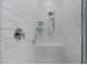 Elegant walk-in shower featuring white subway tile and modern fixtures at 24738 N 175Th Ave, Surprise, AZ 85387