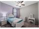 Charming bedroom with a ceiling fan, soft lighting, and comfortable furniture; serene and inviting at 35730 N Pommel Pl, San Tan Valley, AZ 85144