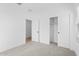 Neutral bedroom with a window, carpeted floor, and closet with sliding doors at 3746 S 234Th Ln, Buckeye, AZ 85326