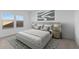 Bright bedroom featuring a luxurious bed with stylish bedside tables and modern decor at 3746 S 234Th Ln, Buckeye, AZ 85326