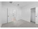 Spacious bedroom with neutral carpet and an open closet at 3746 S 234Th Ln, Buckeye, AZ 85326