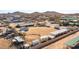 A drone eye view shows the property and surrounding area, including a horse corral and covered parking at 404 W Galvin St, Phoenix, AZ 85086
