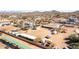 Aerial view of property showing the main house, outbuildings, and surrounding desert community at 404 W Galvin St, Phoenix, AZ 85086