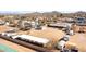 A high aerial of the property including horse facilities, riding areas, and the main house at 404 W Galvin St, Phoenix, AZ 85086