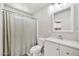 Bathroom featuring a shower with a curtain and a white vanity and sink at 404 W Galvin St, Phoenix, AZ 85086