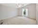 Bedroom with neutral colors, carpeted floor and a picture window at 404 W Galvin St, Phoenix, AZ 85086