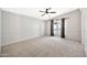 Large, carpeted bedroom features a vaulted ceiling and a window at 404 W Galvin St, Phoenix, AZ 85086