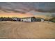Charming single-story home with neutral paint, desert landscaping, and a gated entrance at 404 W Galvin St, Phoenix, AZ 85086