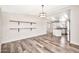 Open floor plan with wood floors and modern lighting at 404 W Galvin St, Phoenix, AZ 85086