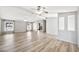 Bright, open-plan living room with neutral decor and updated flooring at 404 W Galvin St, Phoenix, AZ 85086