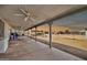 Covered patio with ceiling fans and views of the sunset and a large outdoor area at 404 W Galvin St, Phoenix, AZ 85086