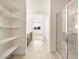 Bright, open bathroom with a glass enclosed shower and lots of storage, with neutral colors at 4332 W Hannah St, San Tan Valley, AZ 85144