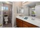 Bathroom with double sink vanity and shower at 45583 W Sheridan W Rd, Maricopa, AZ 85139