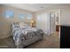Bedroom with natural light and direct access to a bathroom at 45583 W Sheridan W Rd, Maricopa, AZ 85139