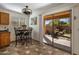 Bright breakfast nook with patio access to outdoor seating area at 45583 W Sheridan W Rd, Maricopa, AZ 85139