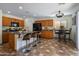 Spacious kitchen with a breakfast bar, stainless steel appliances, and a dining table, great for Gathering meals at 45583 W Sheridan W Rd, Maricopa, AZ 85139