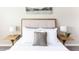 Comfortable bedroom with decorative pillows, side tables and lamps at 4600 N 68Th St # 368, Scottsdale, AZ 85251