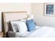 Well-lit bedroom with comfortable bed featuring stylish blue decorative pillow at 4600 N 68Th St # 368, Scottsdale, AZ 85251