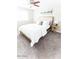 Bright, carpeted bedroom featuring a comfortable bed and a ceiling fan at 4600 N 68Th St # 368, Scottsdale, AZ 85251