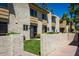 Charming condo exterior featuring stucco and a private front yard with green lawn at 4600 N 68Th St # 368, Scottsdale, AZ 85251
