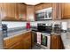 Modern kitchen features stainless steel appliances, granite countertops, and stylish cabinets at 4600 N 68Th St # 368, Scottsdale, AZ 85251