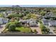 Expansive estate home boasts lush landscaping, mountain views, and charming white picket fence enhancing its curb appeal at 5431 E Lafayette Blvd, Phoenix, AZ 85018