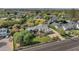 Spacious property with a manicured lawn, mature trees, and a charming home at 5431 E Lafayette Blvd, Phoenix, AZ 85018