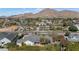 A beautiful aerial view of the property showcasing lush landscaping and a stunning mountain backdrop at 5431 E Lafayette Blvd, Phoenix, AZ 85018