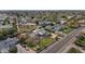 Expansive aerial view showcases a stunning estate with mature landscaping, manicured lawns, and a private courtyard at 5431 E Lafayette Blvd, Phoenix, AZ 85018