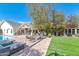 Outdoor oasis featuring a swimming pool, lounge chairs, and a fire pit area at 5431 E Lafayette Blvd, Phoenix, AZ 85018