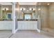 Beautiful bathroom with dual sinks, granite countertops, and glass-enclosed shower at 5431 E Lafayette Blvd, Phoenix, AZ 85018