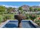 Charming front yard fountain and a rose garden at 5431 E Lafayette Blvd, Phoenix, AZ 85018