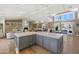 Open floor plan showcasing the kitchen with a large center island connecting to the living room at 5431 E Lafayette Blvd, Phoenix, AZ 85018