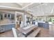 Bright eat-in kitchen featuring a large island, modern lighting, stainless steel appliances and hardwood flooring at 5431 E Lafayette Blvd, Phoenix, AZ 85018