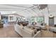 Spacious living area with high ceilings open to the kitchen and dining areas at 5431 E Lafayette Blvd, Phoenix, AZ 85018