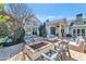 Outdoor patio with a cozy fire pit and comfortable seating for relaxing or entertaining at 5431 E Lafayette Blvd, Phoenix, AZ 85018