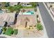 Aerial view of a well-maintained home with a desert-landscaped front yard, private pool, and tile roof at 604 W Villa Rita Dr, Phoenix, AZ 85023