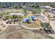 Aerial view of community park featuring walking trails, a playground, and open spaces for recreation at 604 W Villa Rita Dr, Phoenix, AZ 85023